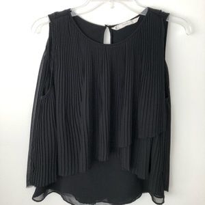 Zara black top overlaid with plated sheer fabric